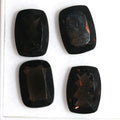 Lot de 4 pièces de quartz fumé facetté rectangulaire 14x10mm.