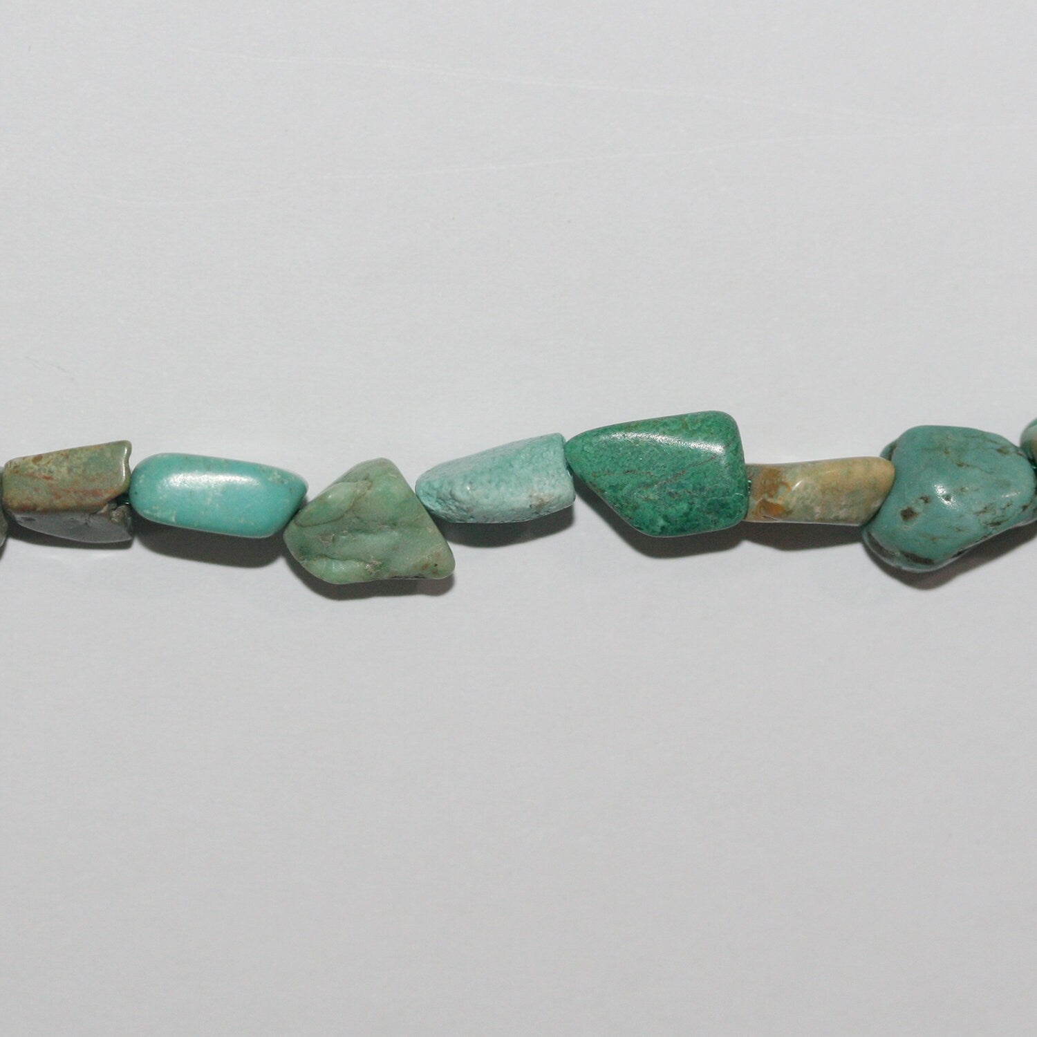 Cuentas irregulares lisas de turquesa de 16" (6-8 mm, aprox.), tira de 40 cm
