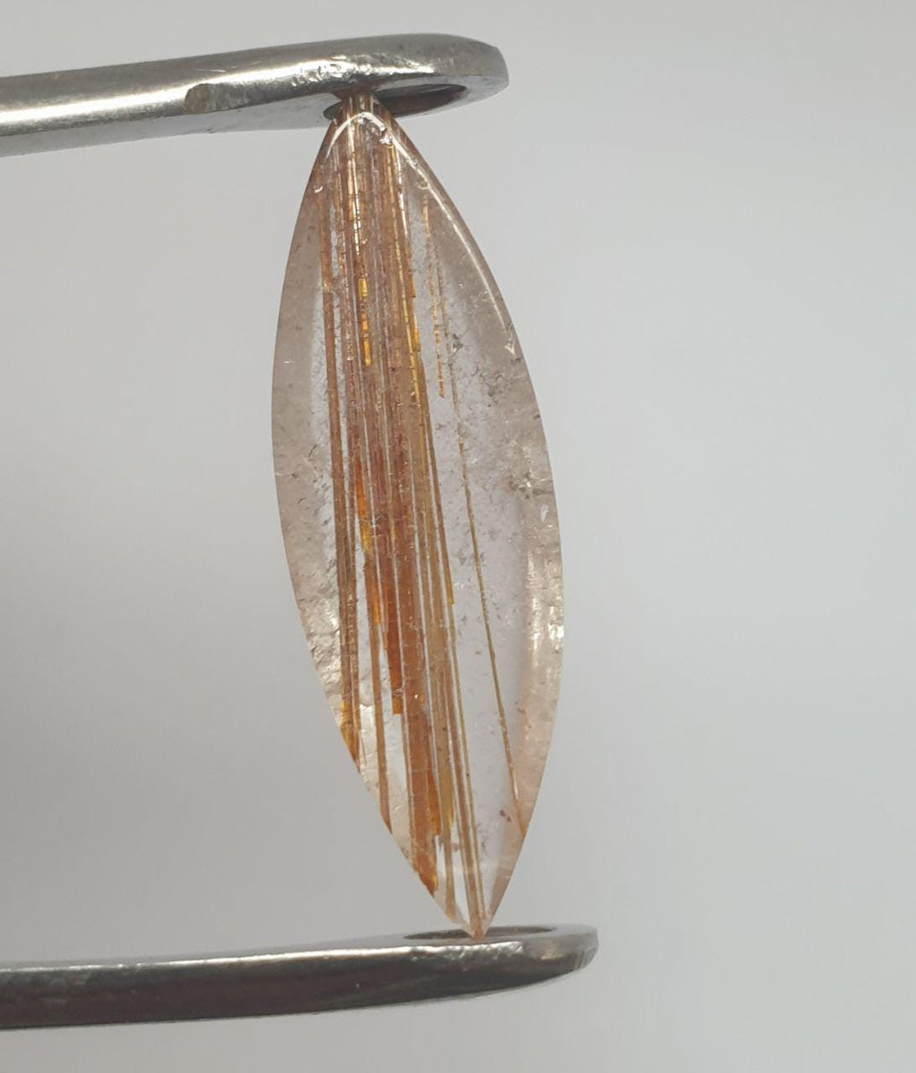 Rutilated Quartz  Marquise  Cabochon 27.5x8.8mm. (6.7ct.)