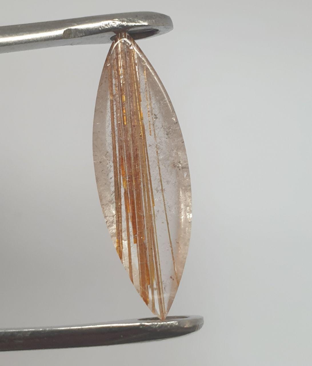 Rutilated Quartz  Marquise  Cabochon 27.5x8.8mm. (6.7ct.)