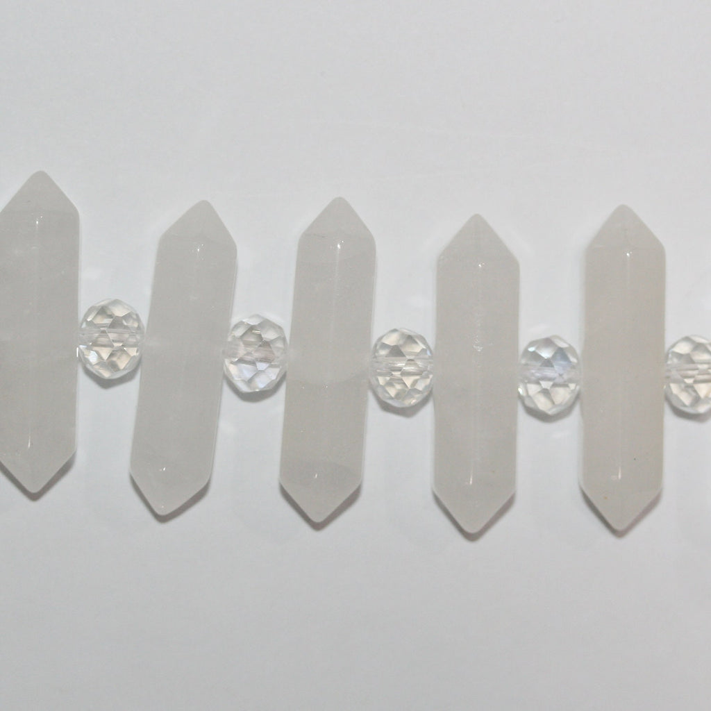 Cuentas de punta de lanza facetadas de cuarzo cristal de roca de 16", 32 x 8 mm aprox. Tira de 40 cm.