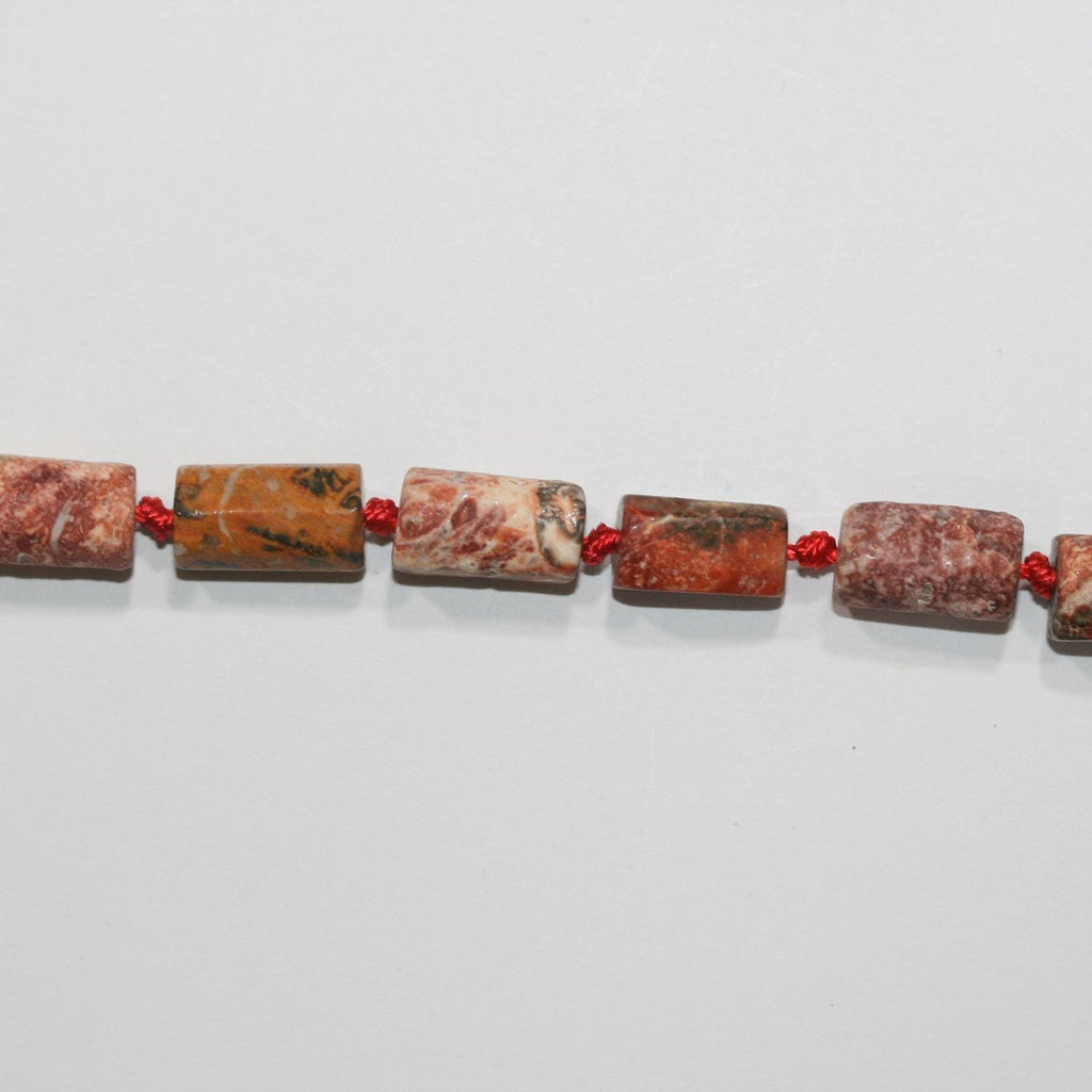 Jaspe léopard lisse en forme de tonneau de 14 pouces (14 x 8 mm). Filetage approximatif : 38 cm. Réf. 14740