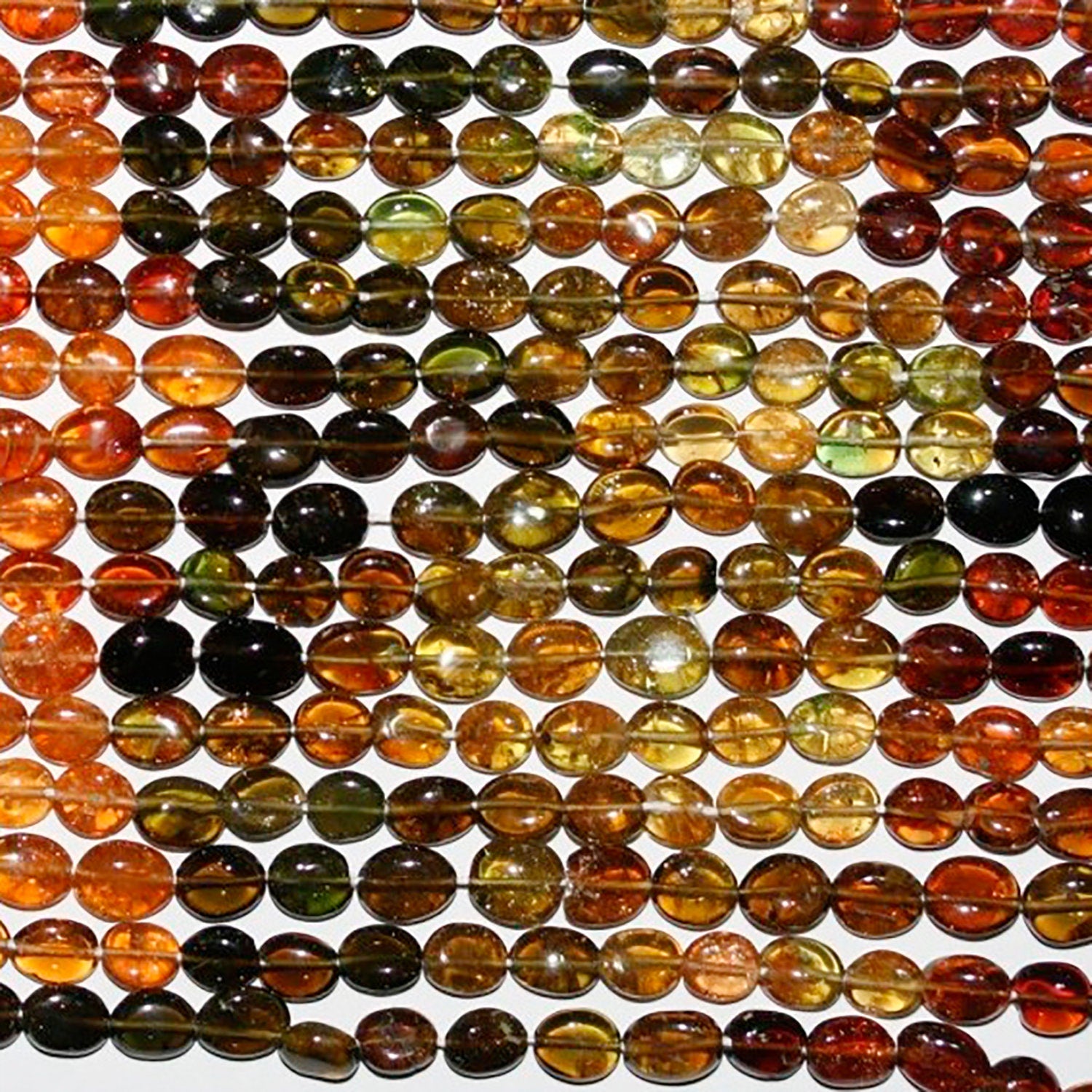 Tourmaline St Petro ovale lisse 6x4mm - Fil de 36 cm