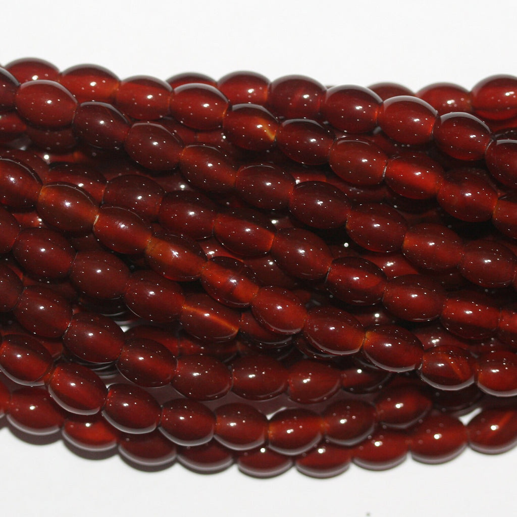 16" Cuentas de barril liso de Santa Cornalina 8x6 mm.-Hilo 40 cm.