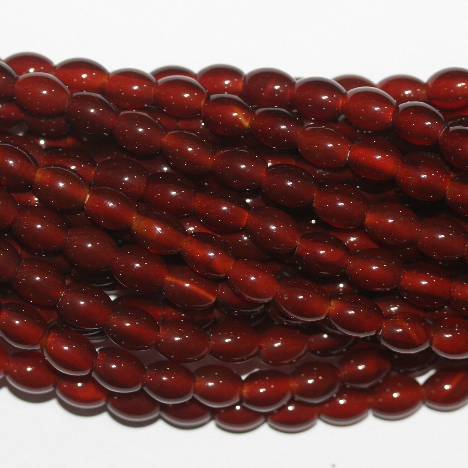 16" Cuentas de barril liso de Santa Cornalina 8x6 mm.-Hilo 40 cm.