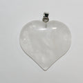 Pendentif cœur lisse en quartz cristal de roche 40 mm.