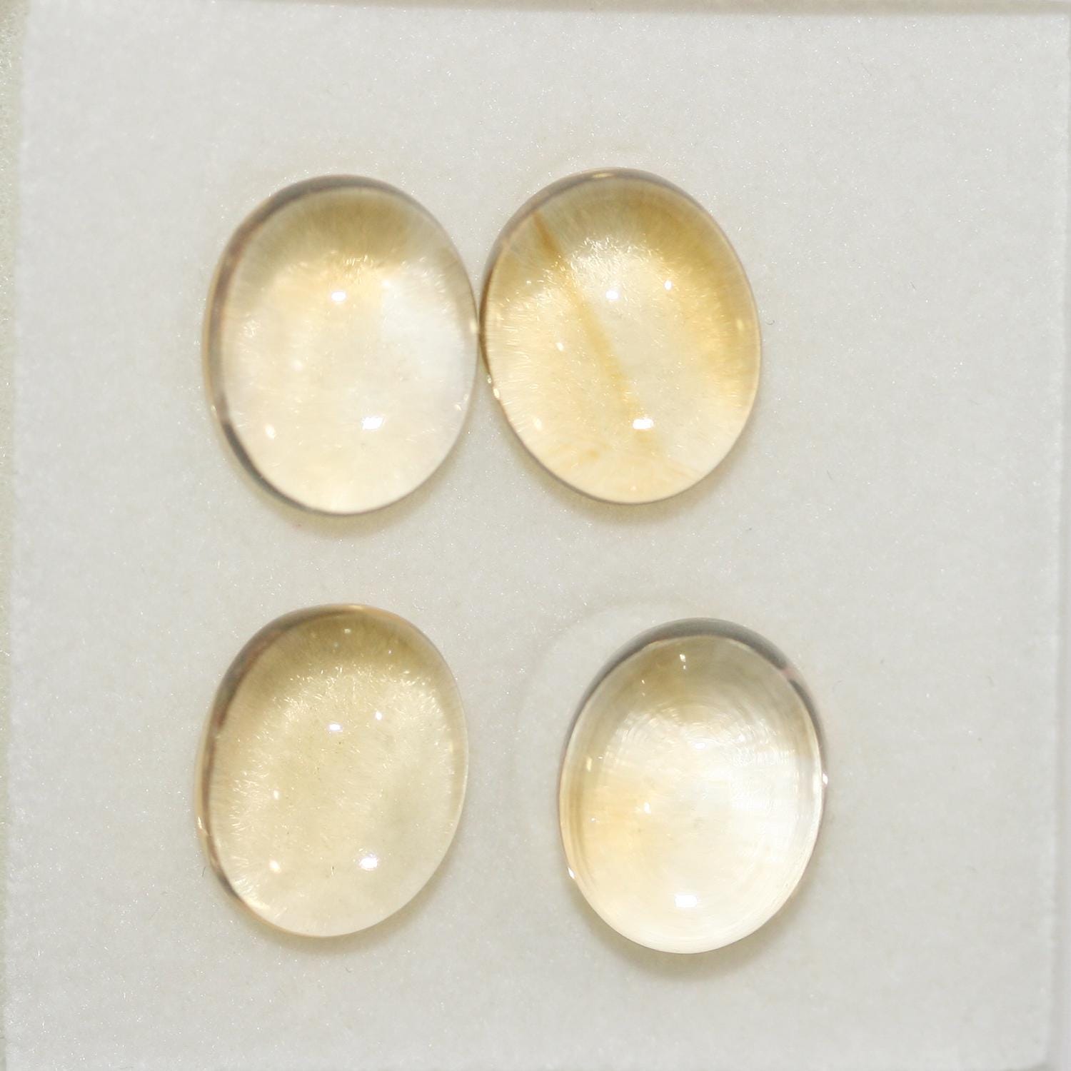 Lote de 4 cabujones ovalados de citrino de 11 x 9 mm. (4 piezas)