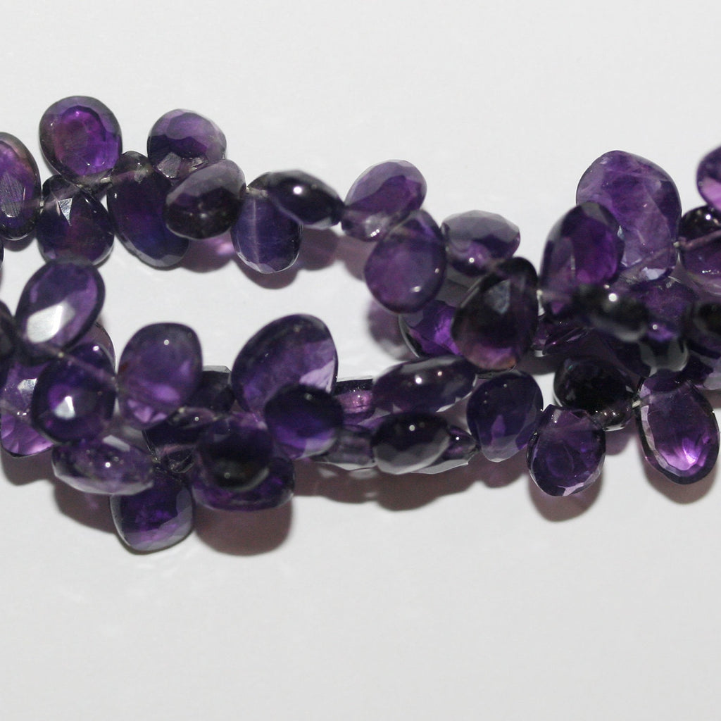 Cuentas de amatista facetadas de 8" x 7 x 5 mm (aprox.), hilo de 20 mm.