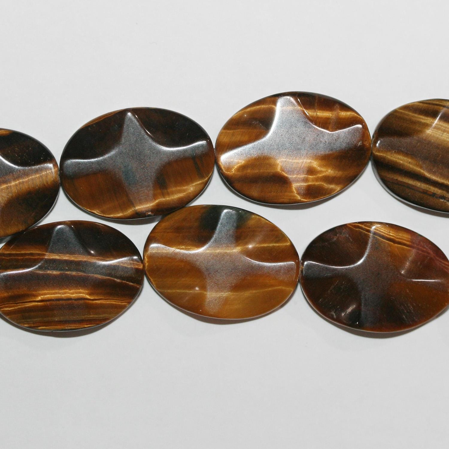 12" St Tiger Eye Smooth Wavy Oval Beads 24x17mm.-Strand 32cm.