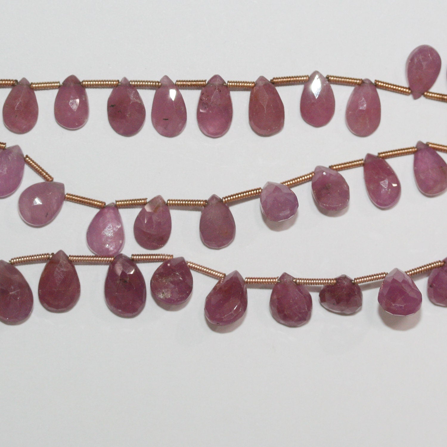 Perles en forme de goutte facettées St Ruby 8" 10x7mm.-Rig 20cm.