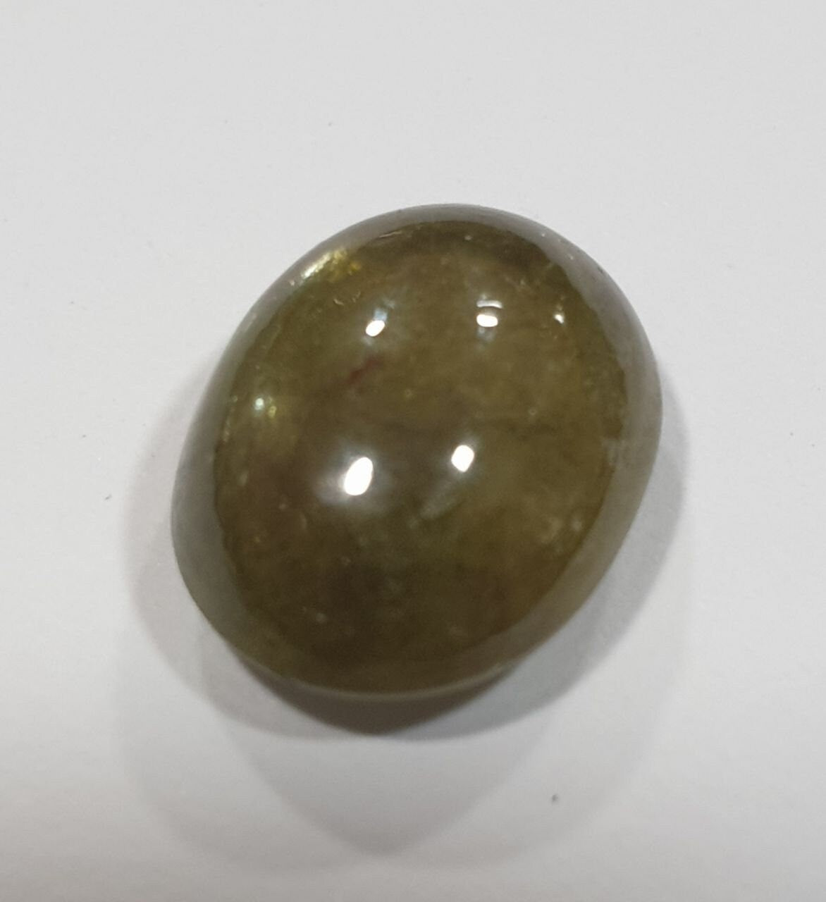 Green Sapphire Oval Cabochon 11.7x9mm.(5.7ct.).