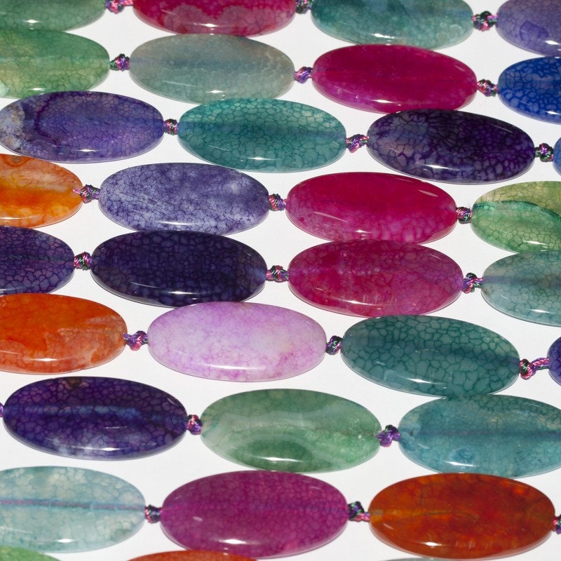 Perles ovales lisses en agate multicolore 40 x 20 mm. Fil de 42 cm. - Perles et pierres précieuses de créateur