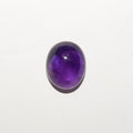 Lote de 4 cabujones ovalados de amatista de 12 x 10 mm. (4 uds.)