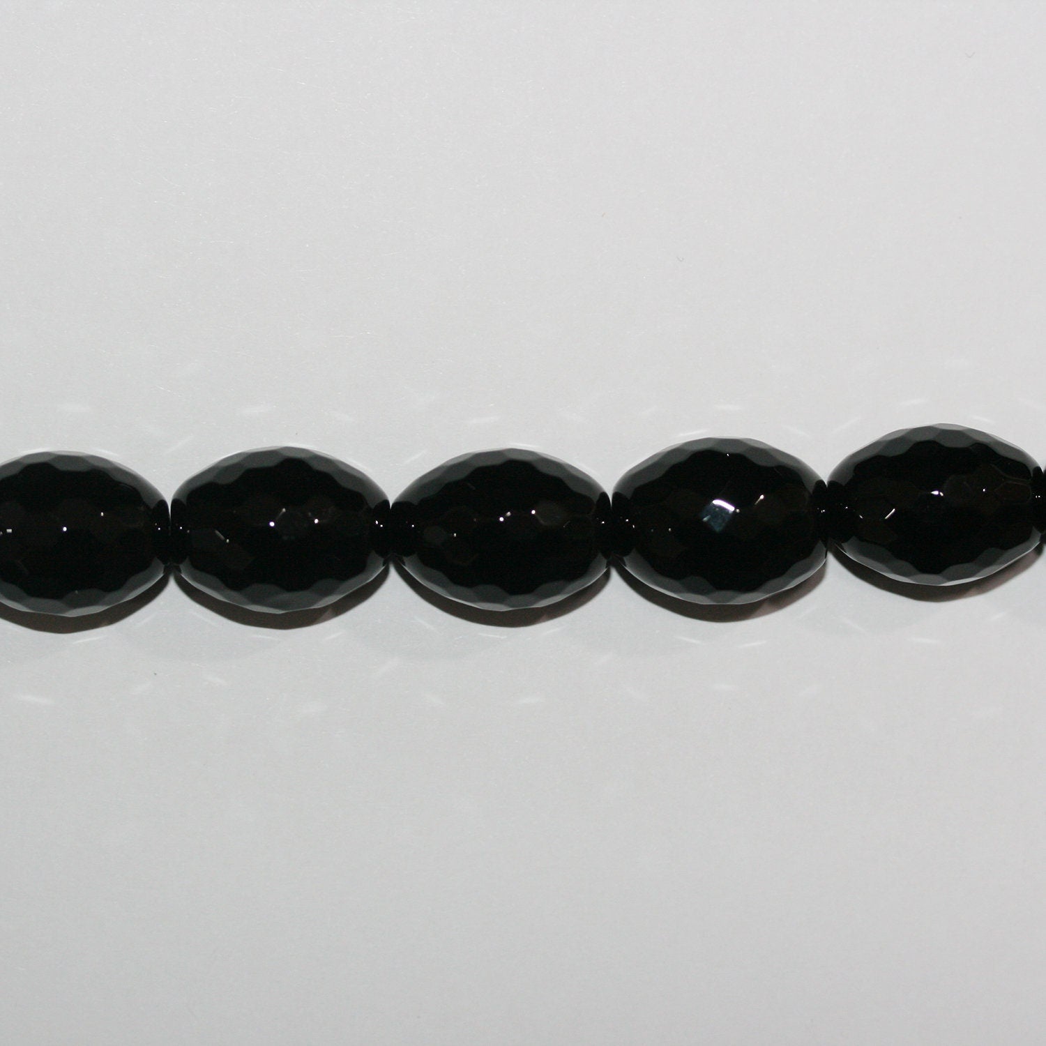 Cuentas de barril facetadas de ónix santo de 16" de 20 x 15 mm, hilo de 40 cm.