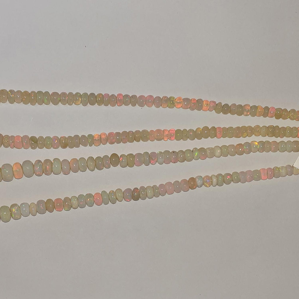 Perles rondelles lisses dégradées en opale éthiopienne St, 16 pouces (40,6 cm), 5 x 2 à 9 x 6 mm environ. Longueur du fil : 42 cm.