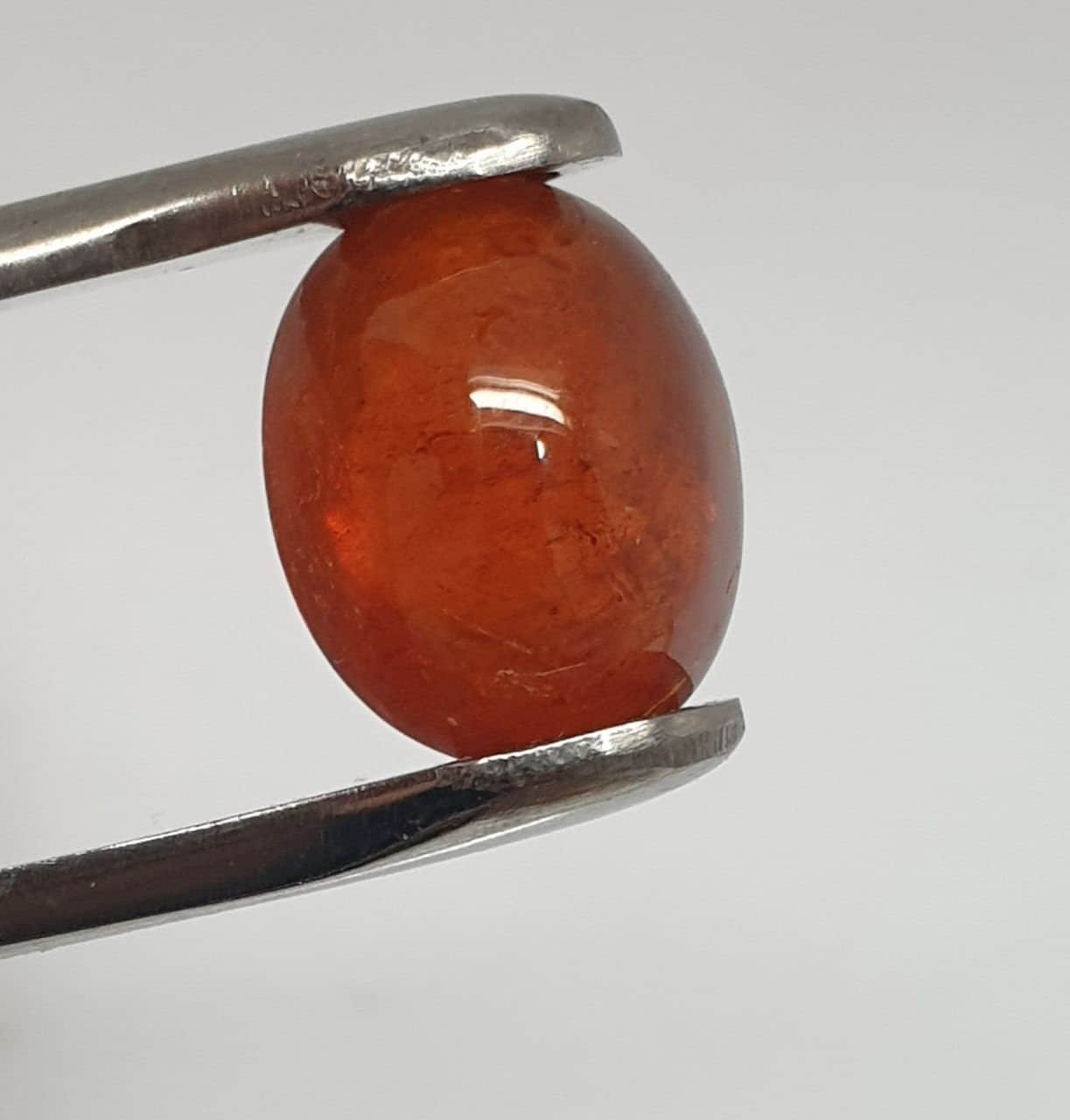 Spessartine Garnet Oval Cabochon 13x10.4mm. (10.34ct.).