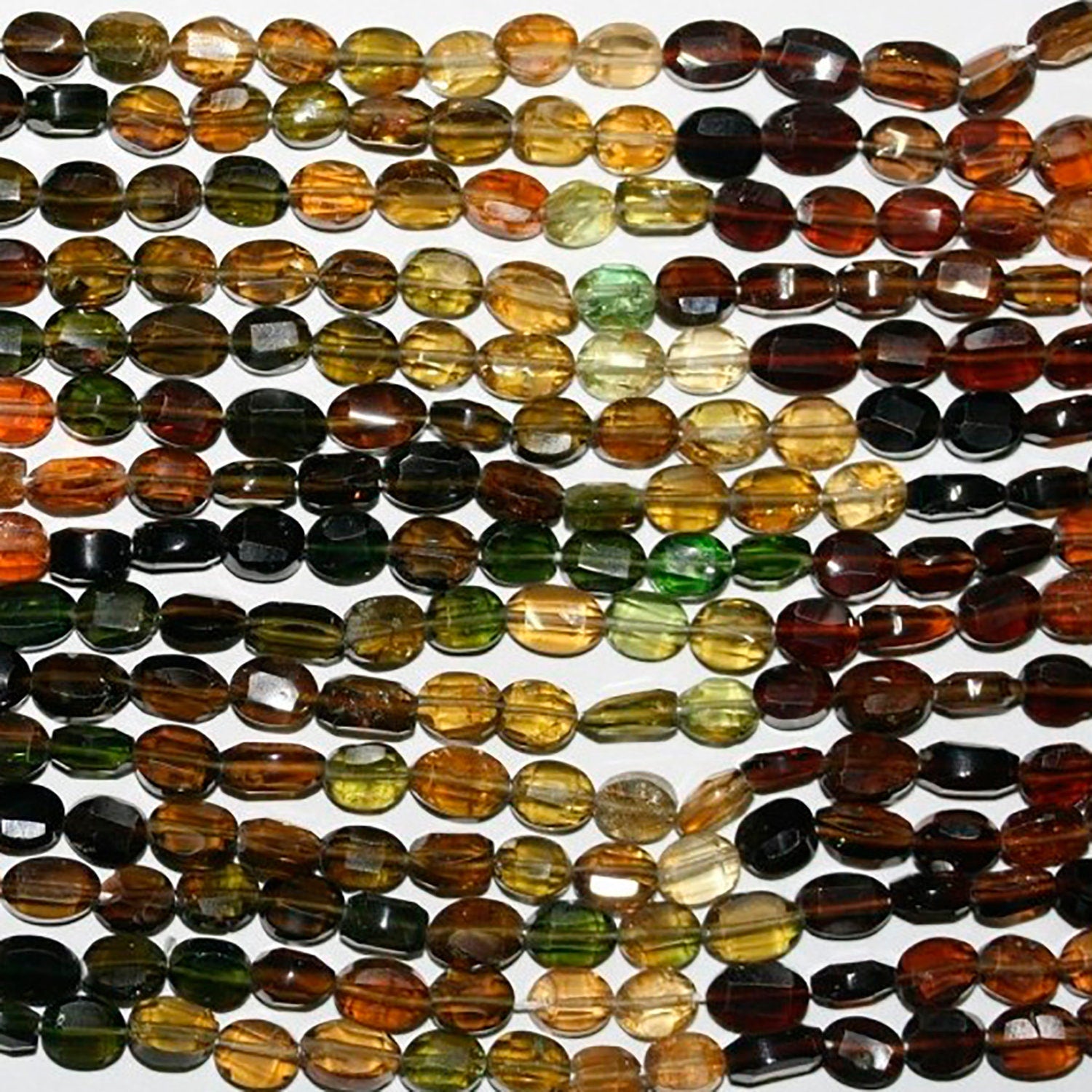 13" St Petro Tourmaline Faceted Oval 5-6mm.-Strand 34cm.