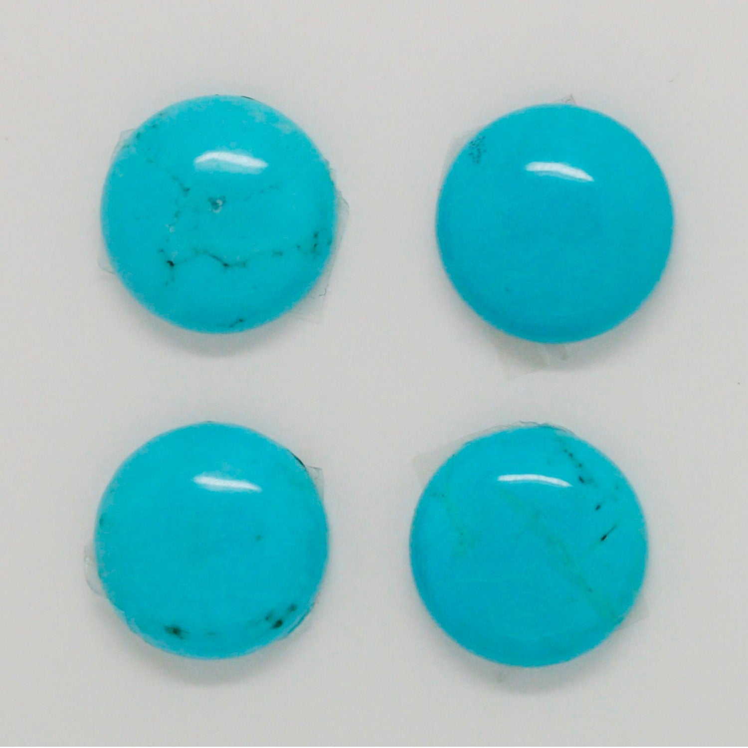 Lote de 4 cabujones redondos de howlita azul de 14 mm (4 unidades)