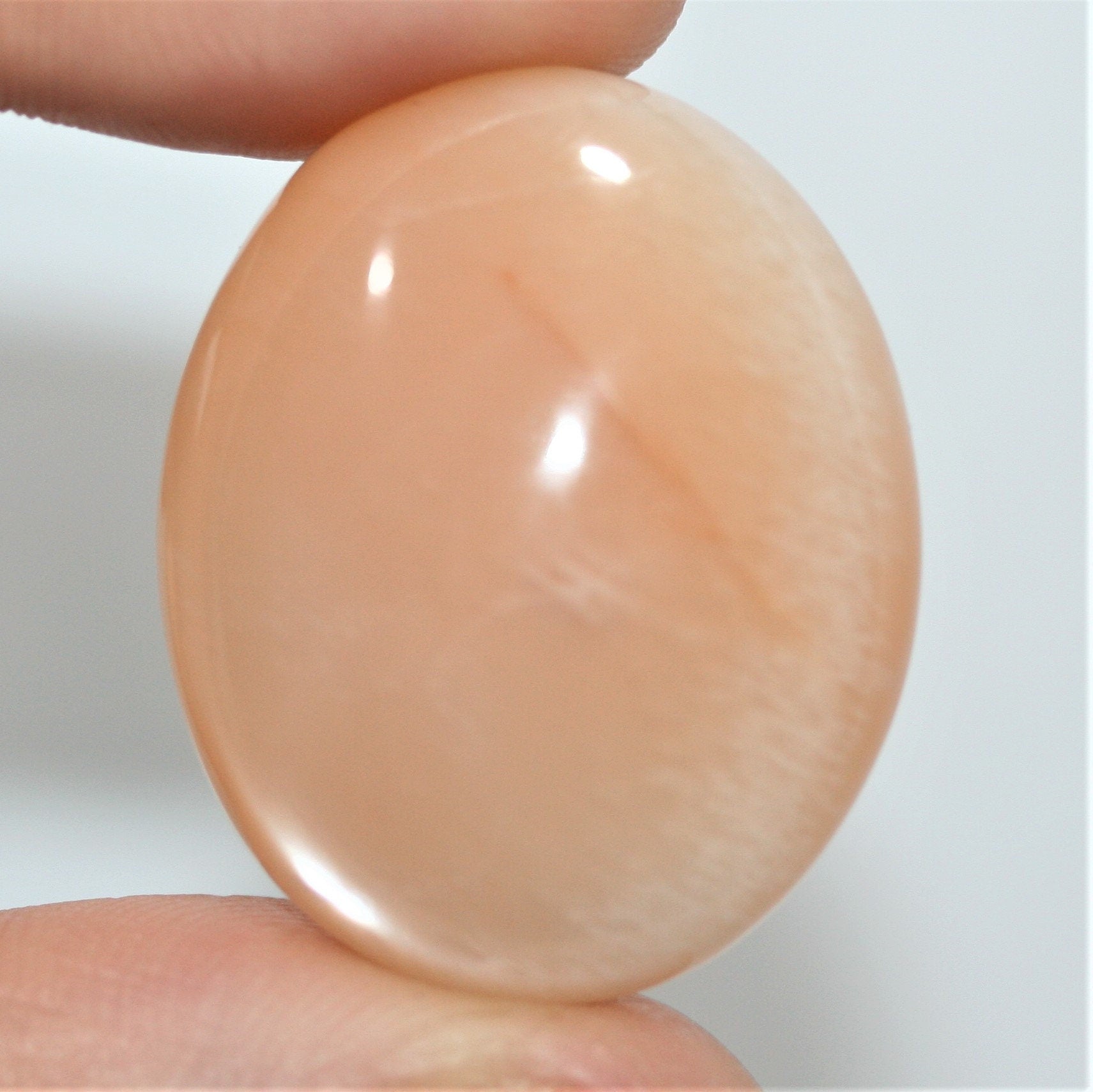 Gros cabochon ovale en pierre de lune pêche, 30 x 24,5 mm (50,78 ct) - Pierre de collection, fournisseur de pierres rares - Gemmes naturelles