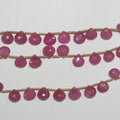 Perles en saphir rose St de taille dégradée, en forme de goutte, de 5 à 7 mm. Longueur approximative du fil : 21 cm.