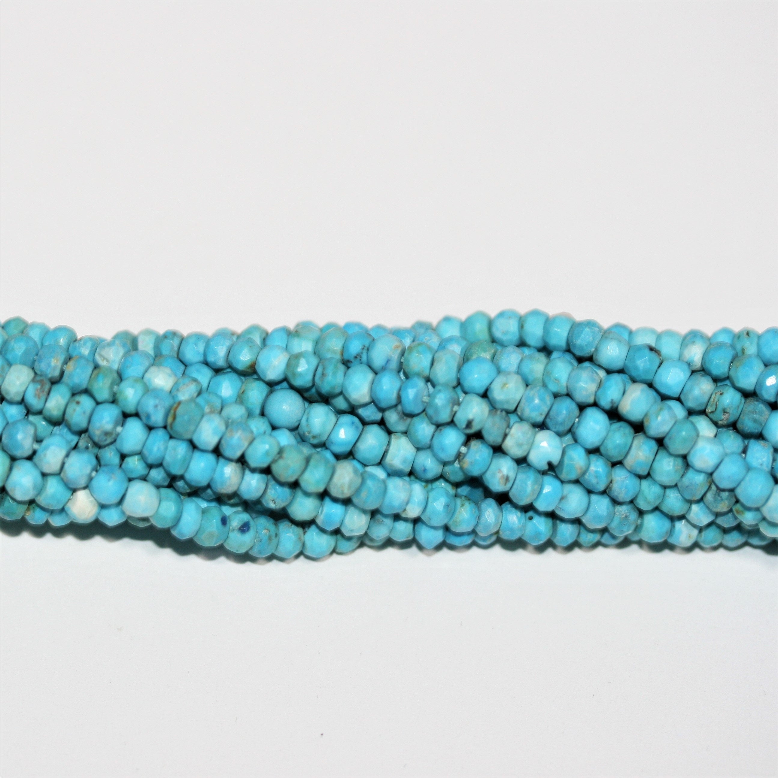 13" St Turquoise Faceted Rondelle Beads 4x3mm.-Strand 34cm.