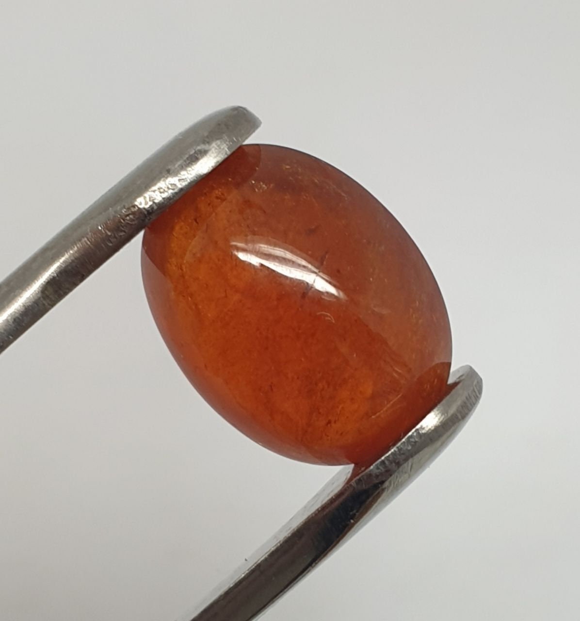 Spessartine Garnet Oval Cabochon 14x10.6mm. (10.7ct.).