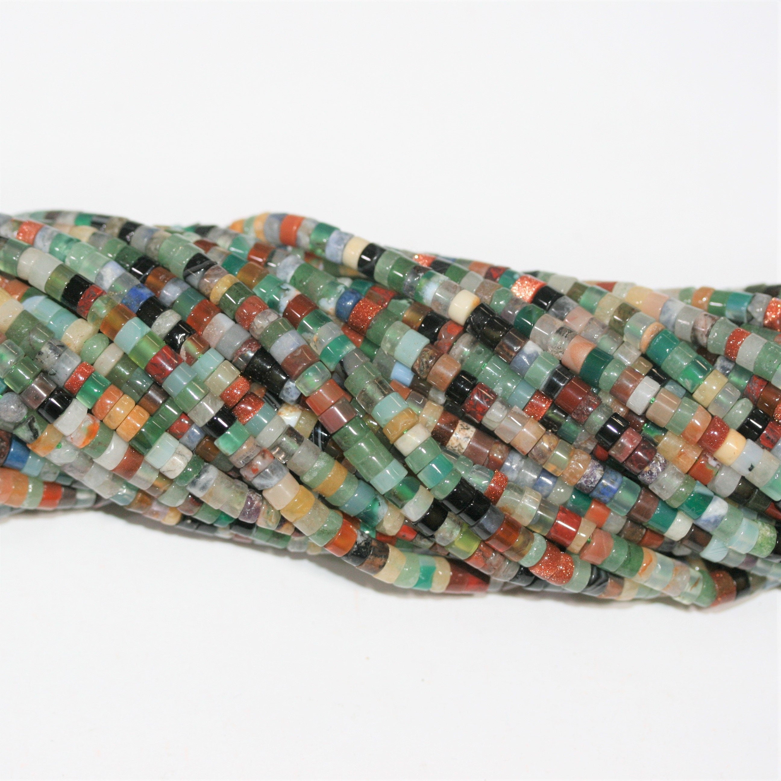 Perles disques lisses en pierre multicolore 15" 4x2mm.- Brin 39cm.