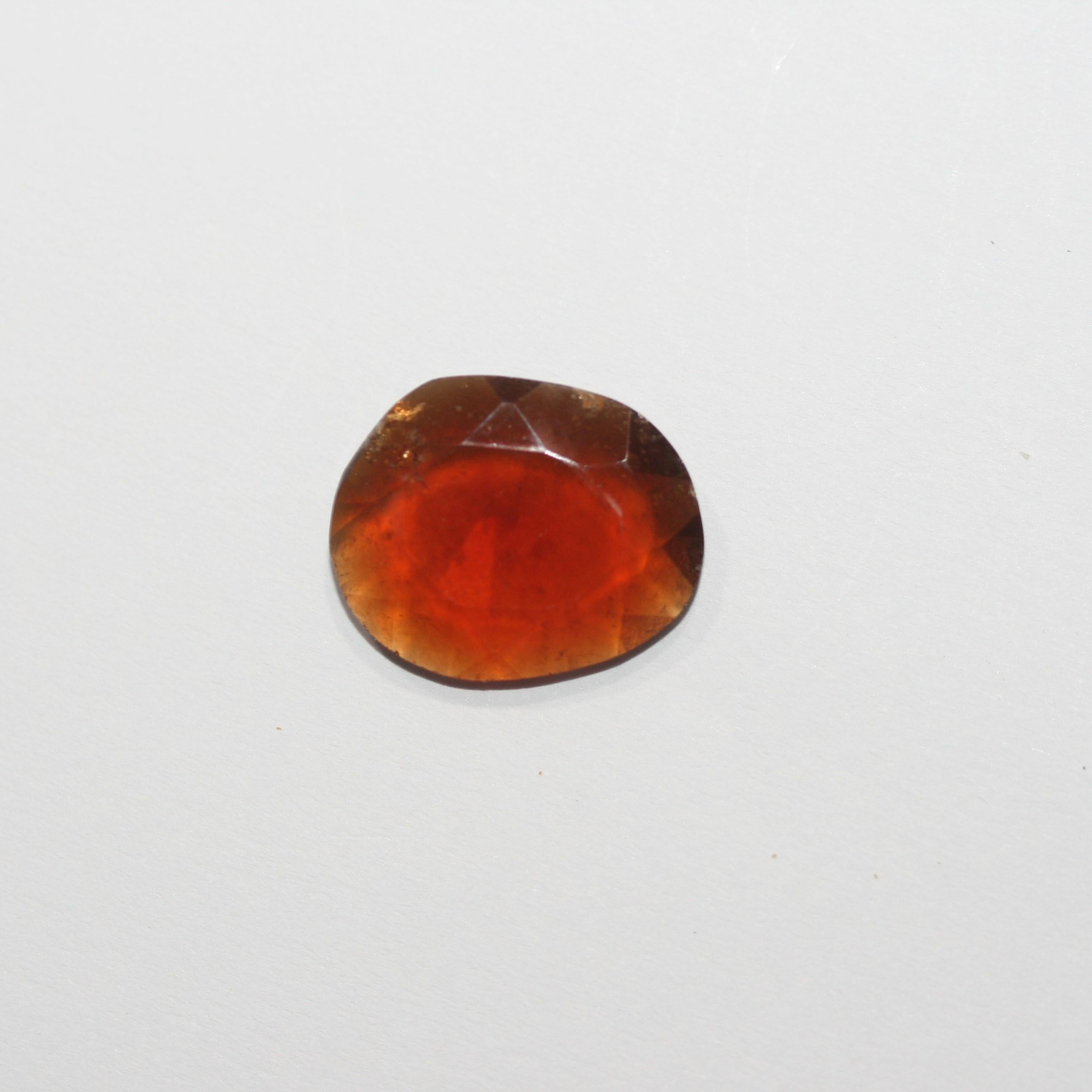 Faceted Oval Hesonite Garnet Cabochon 16.5x13.5mm. (7.12ct.)