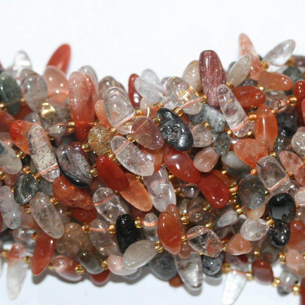 Perles de quartz rutile St à pointes lisses, 14 x 7 mm environ. Longueur du fil : 39 cm environ. Réf. 14741