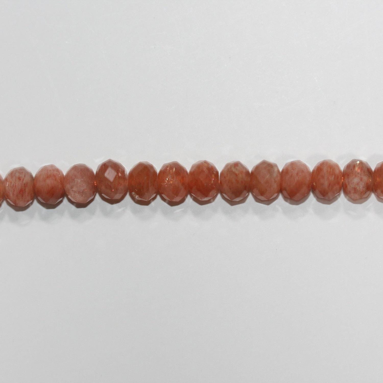 Cuentas redondas facetadas de piedra solar de 16" (7 x 5 mm). Hilo de 40 cm aprox.