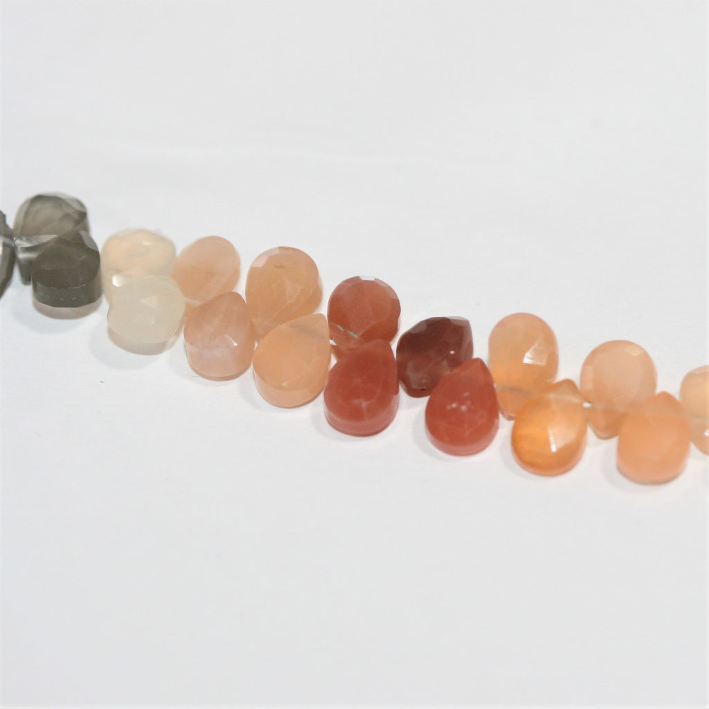 Cuentas de gota facetadas de piedra lunar multicolor de 7" St 7x5 mm - Hilo de 18 cm.