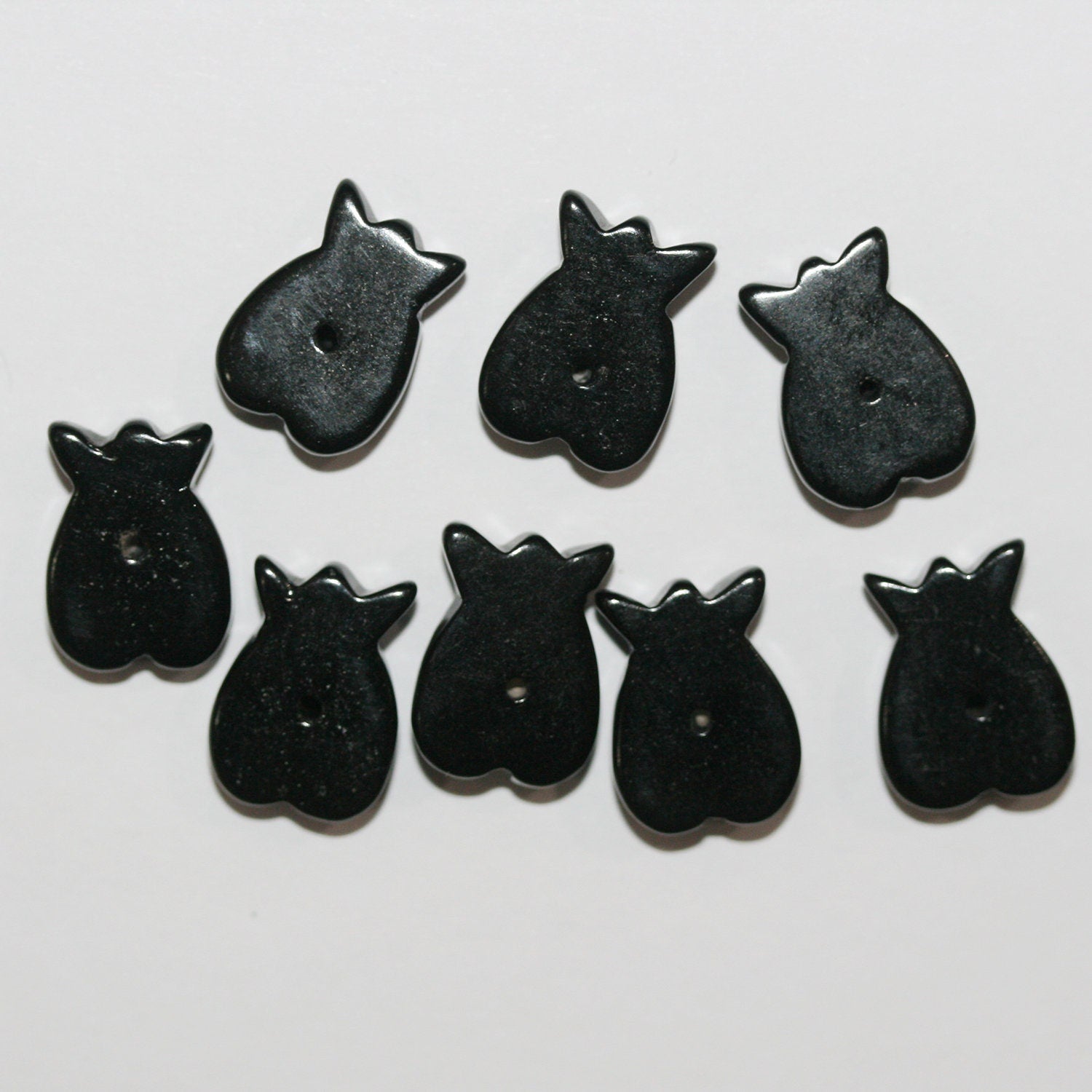 Lote de 8 tulipanes perforados a la mitad, 14 x 10 mm (4 pares)