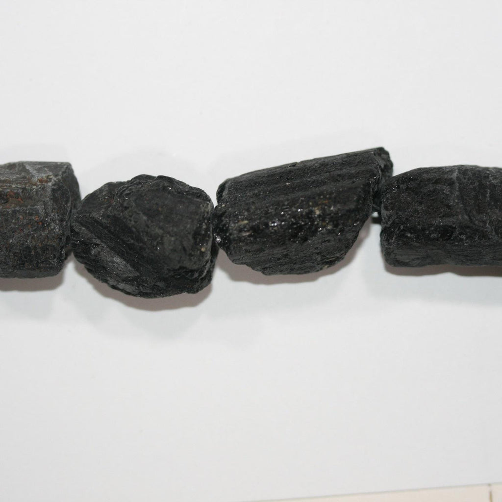 Cuentas de turmalina negra sin pulir de 16", 18 x 14 mm. Aprox. - Hilo de 40 cm.