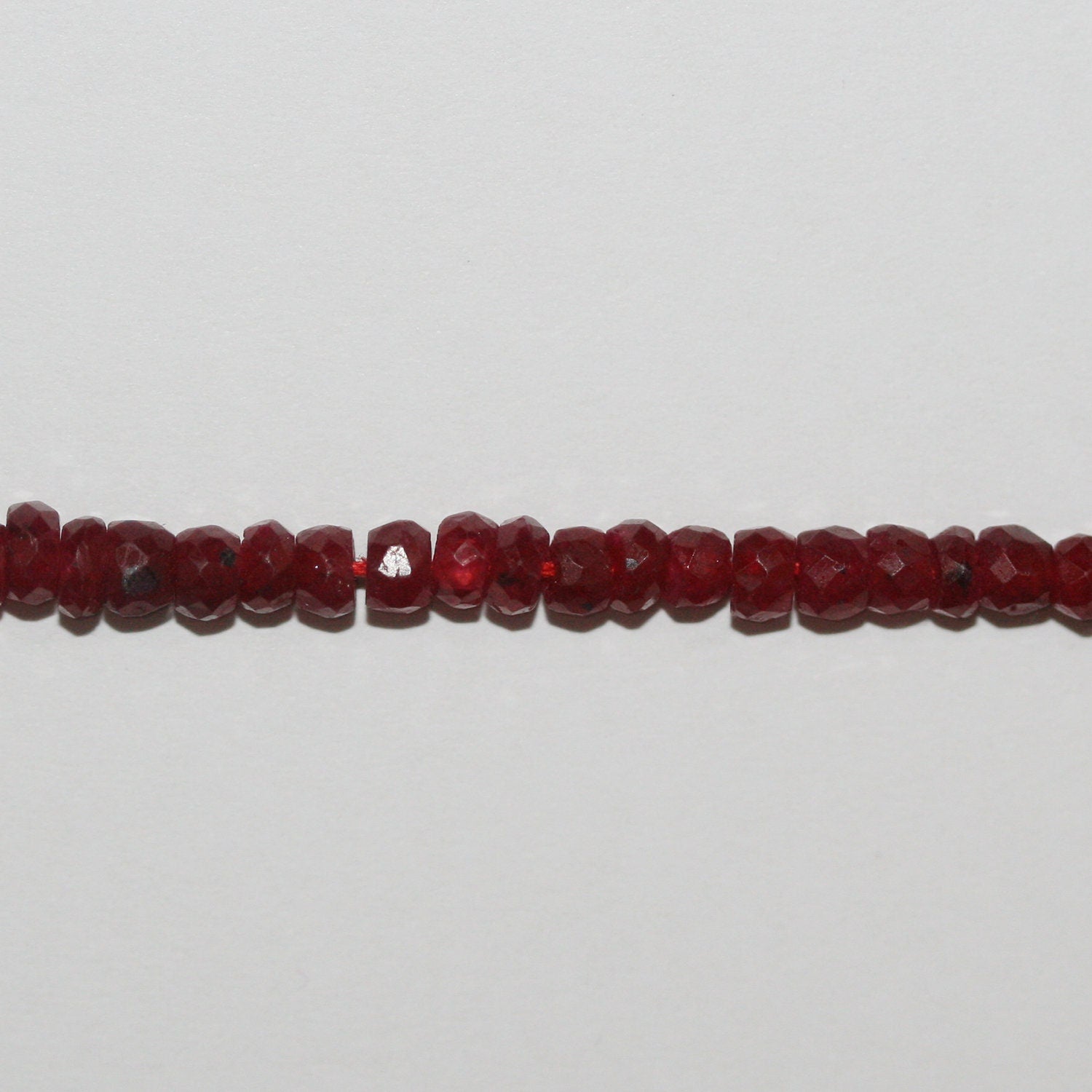 13" St Ruby Faceted Rondelle Beads 4x2mm.-Strand 33cm.