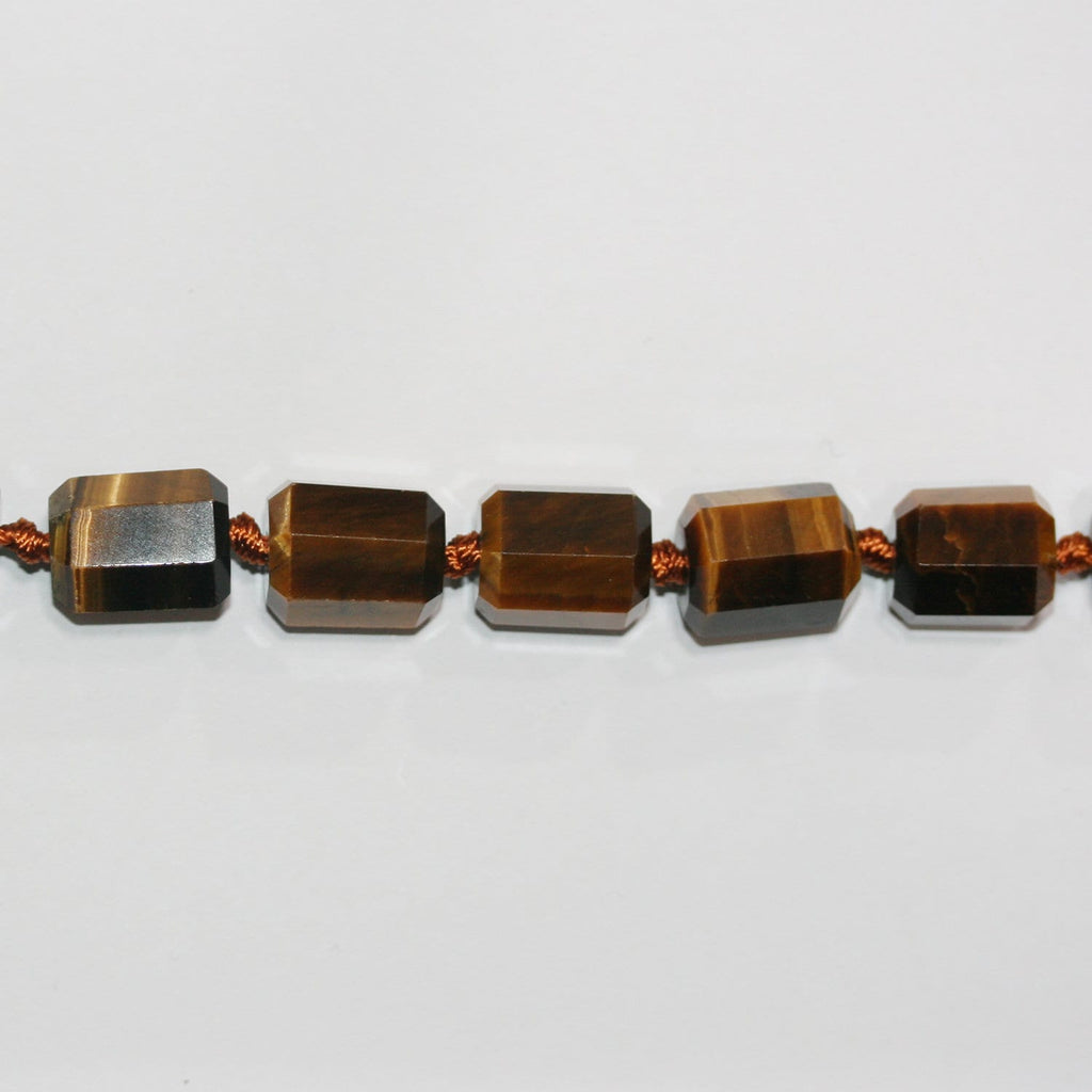 Cuentas de barril facetadas de ojo de tigre de 16" de St. 15 x 12 mm - Hilo de 40 cm.