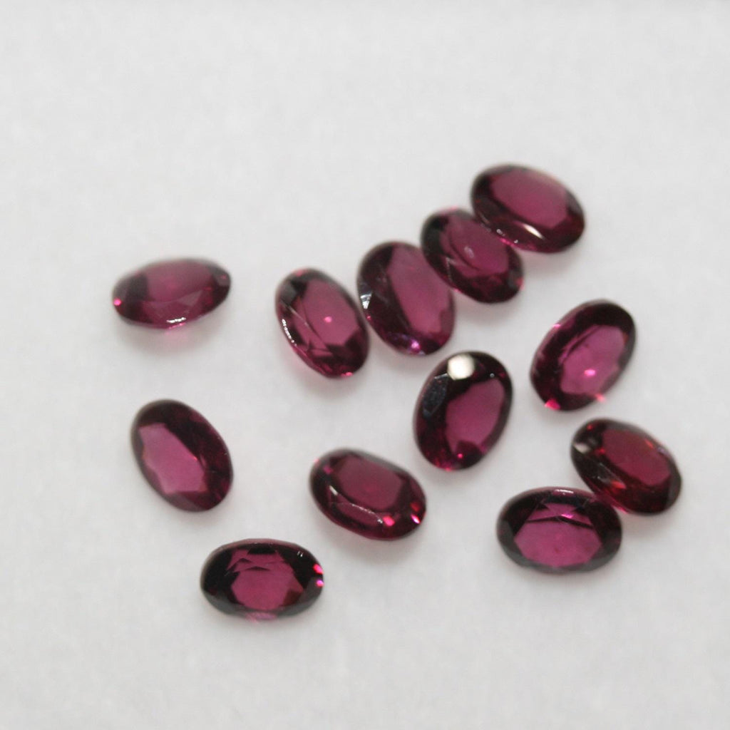 Lot de grenats rhodolite ovales à facettes 5x4mm (12 pièces).