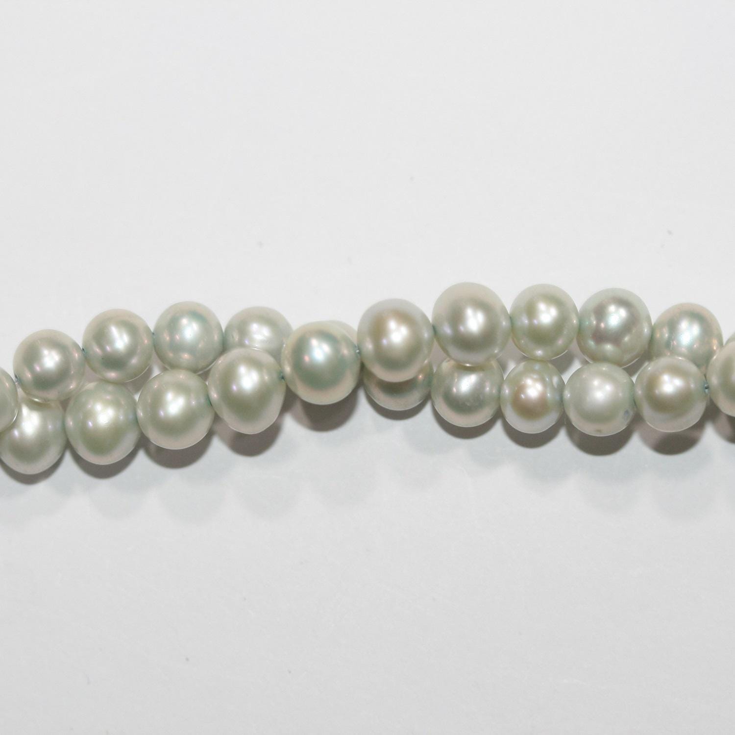 Perles rondes en nacre d'eau douce vert clair, 15 pouces, 6-6,5 mm - Fil de 38 cm - Réf. 3480