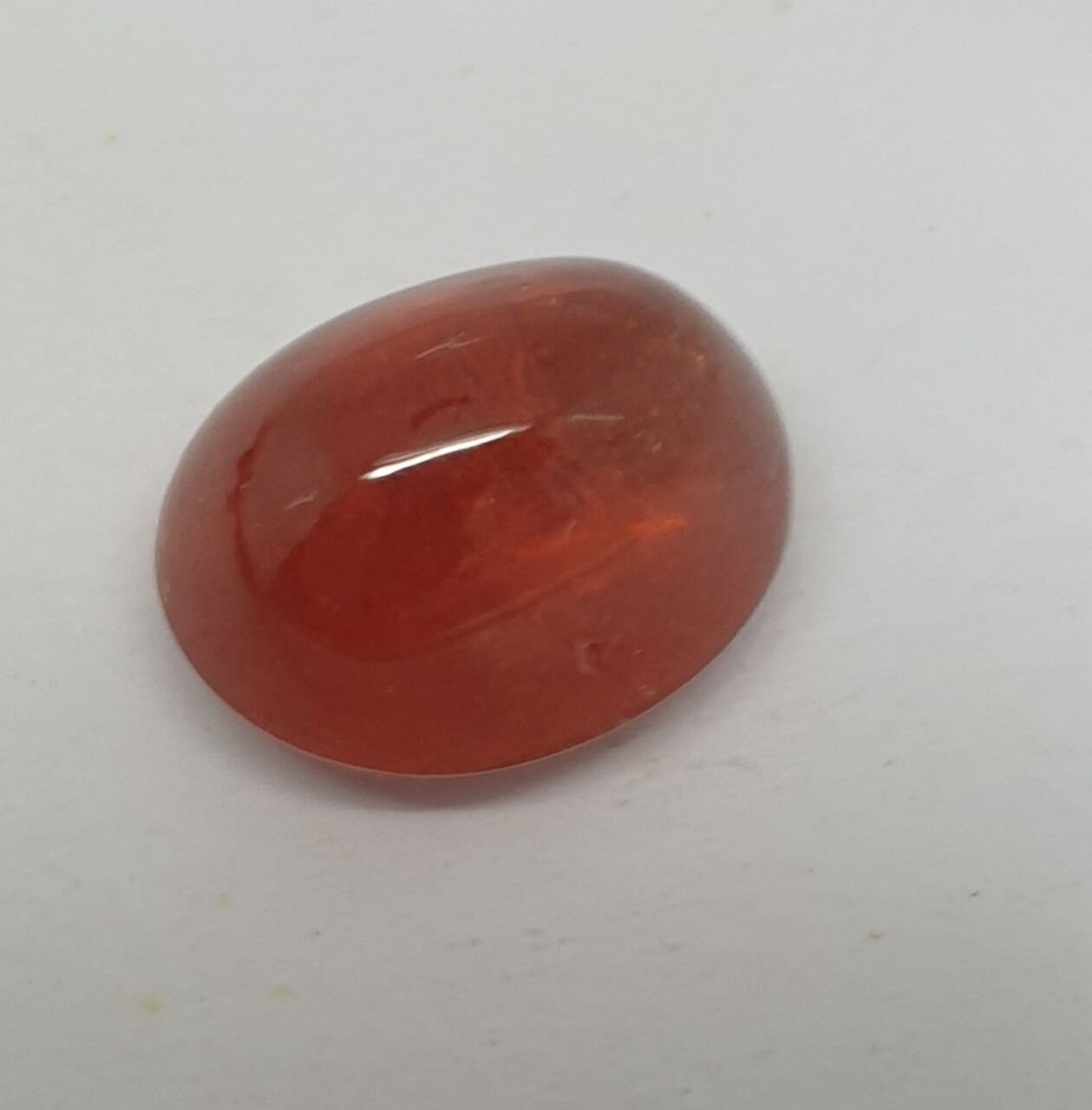 Spessartine Garnet Oval Cabochon 13x10.4mm. (10.34ct.).