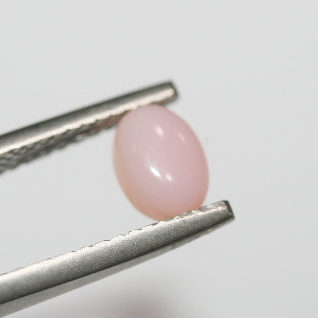 Lote de 20 cabujones ovalados de ópalo rosa de 7x5 mm. (20 uds.).
