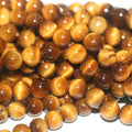 Cuentas redondas lisas de ojo de tigre de 16" (16 mm) - Hilo de 40 cm