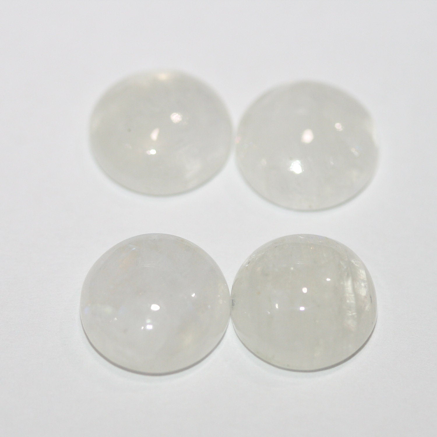 Lote de 4 cabujones redondos lisos de piedra lunar de 12 mm. (4 piezas).