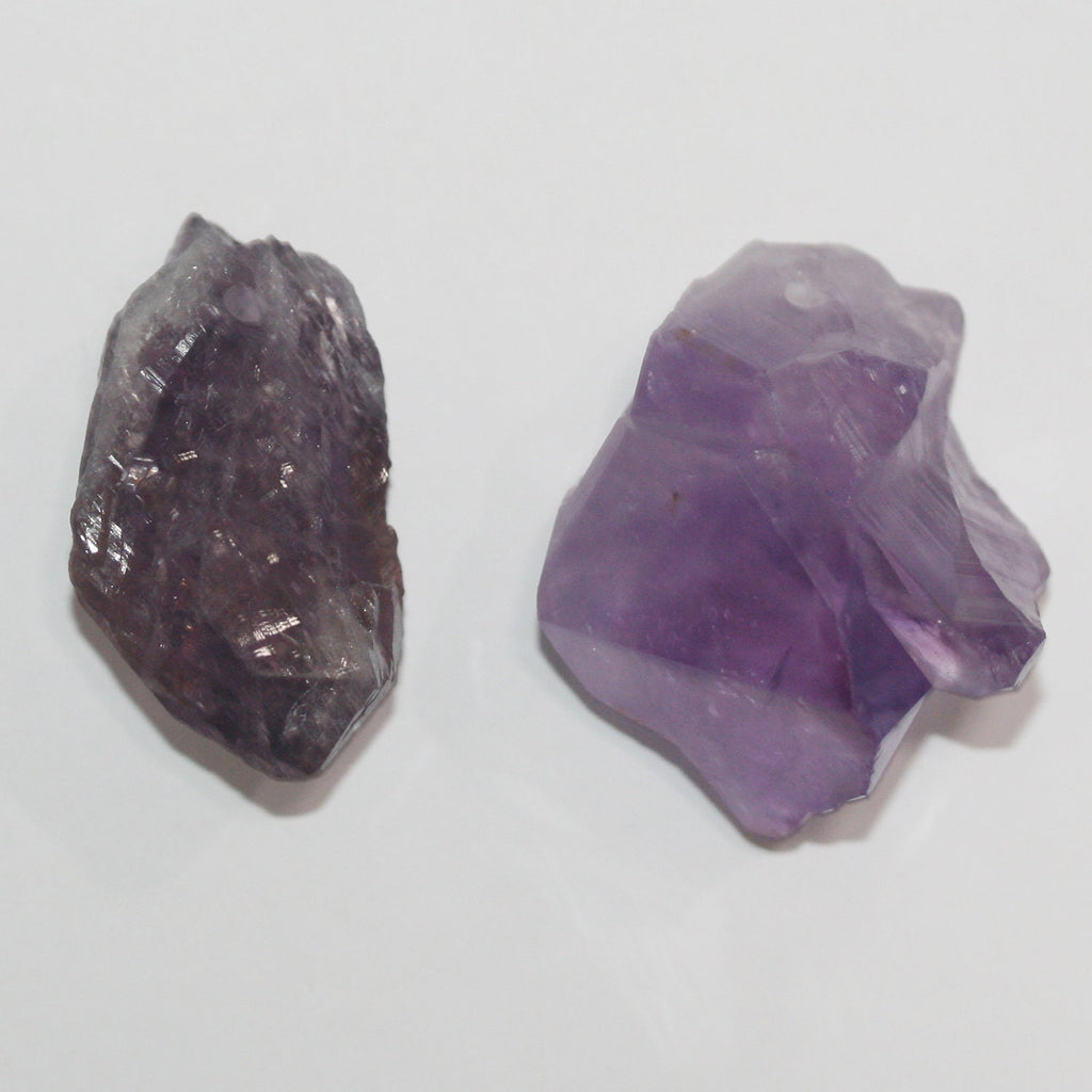 Colgante de amatista cruda 47x25 mm aprox.