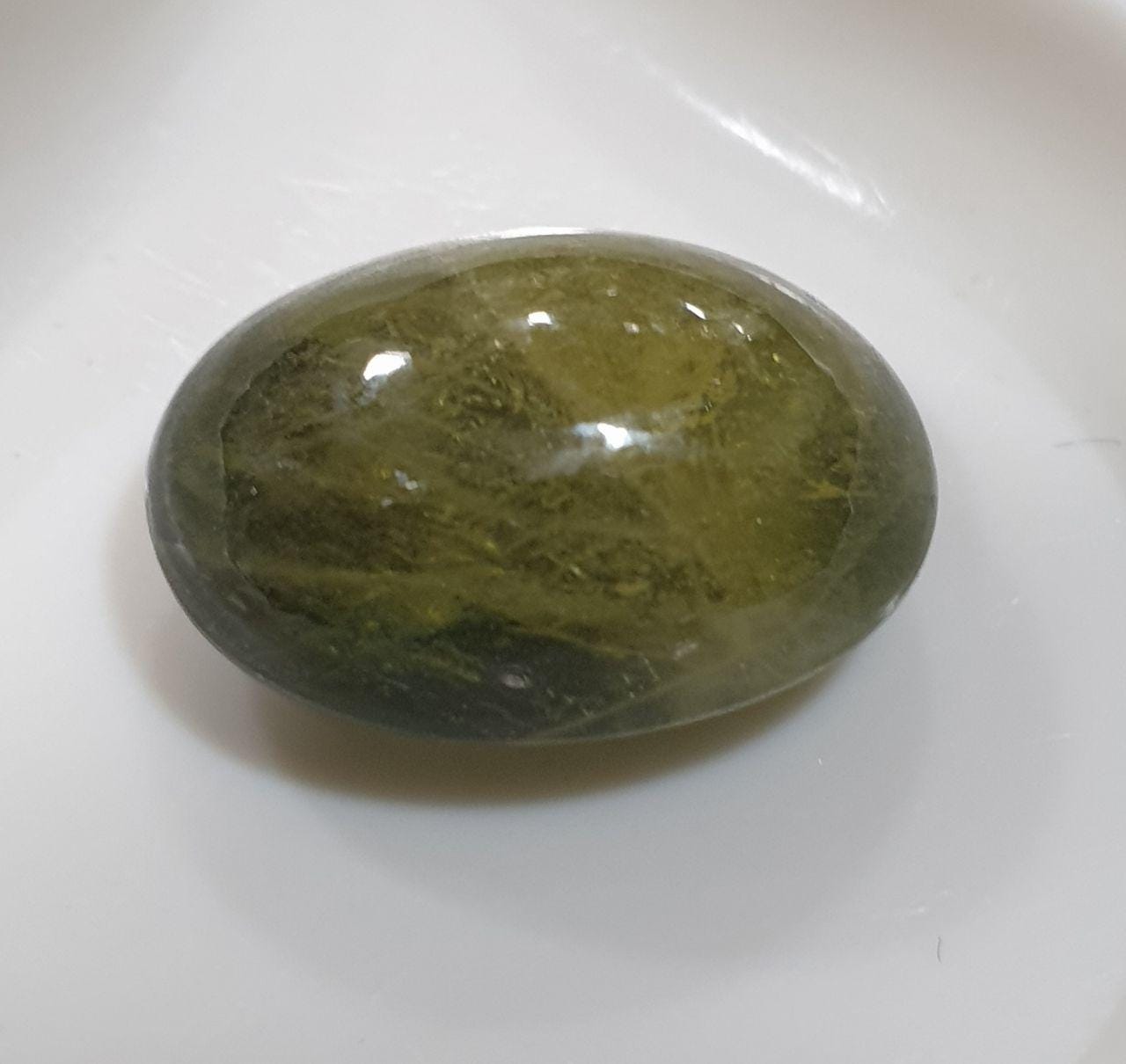 Natural Green  Sapphire Oval Cabochon. 15.8x12.2mm. (14ct.)