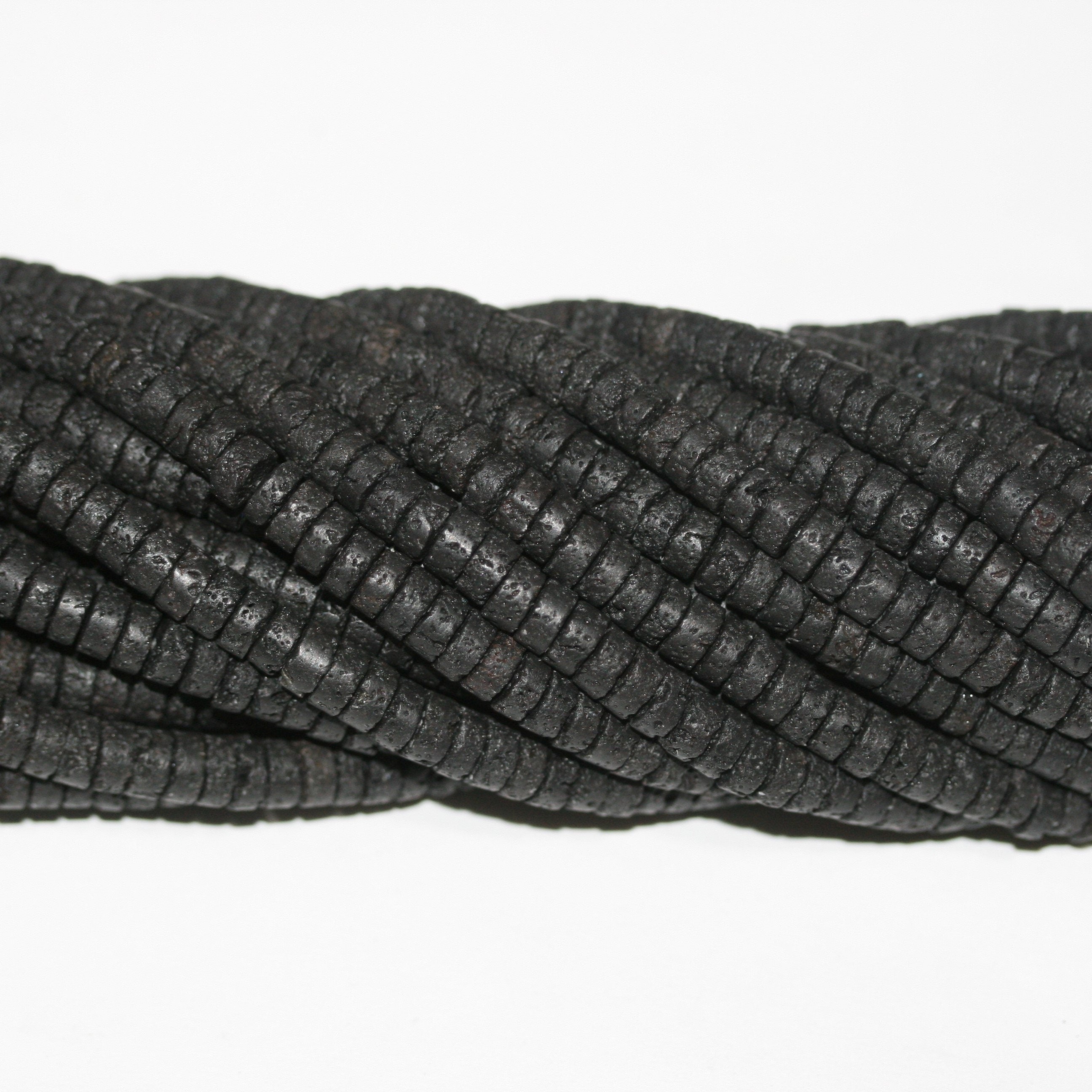 Perles rondelles lisses St. Lava 15" 6x3mm.- Brin 39cm.