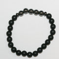 Bracelet rond en onyx finition mate et hématite 8 mm.
