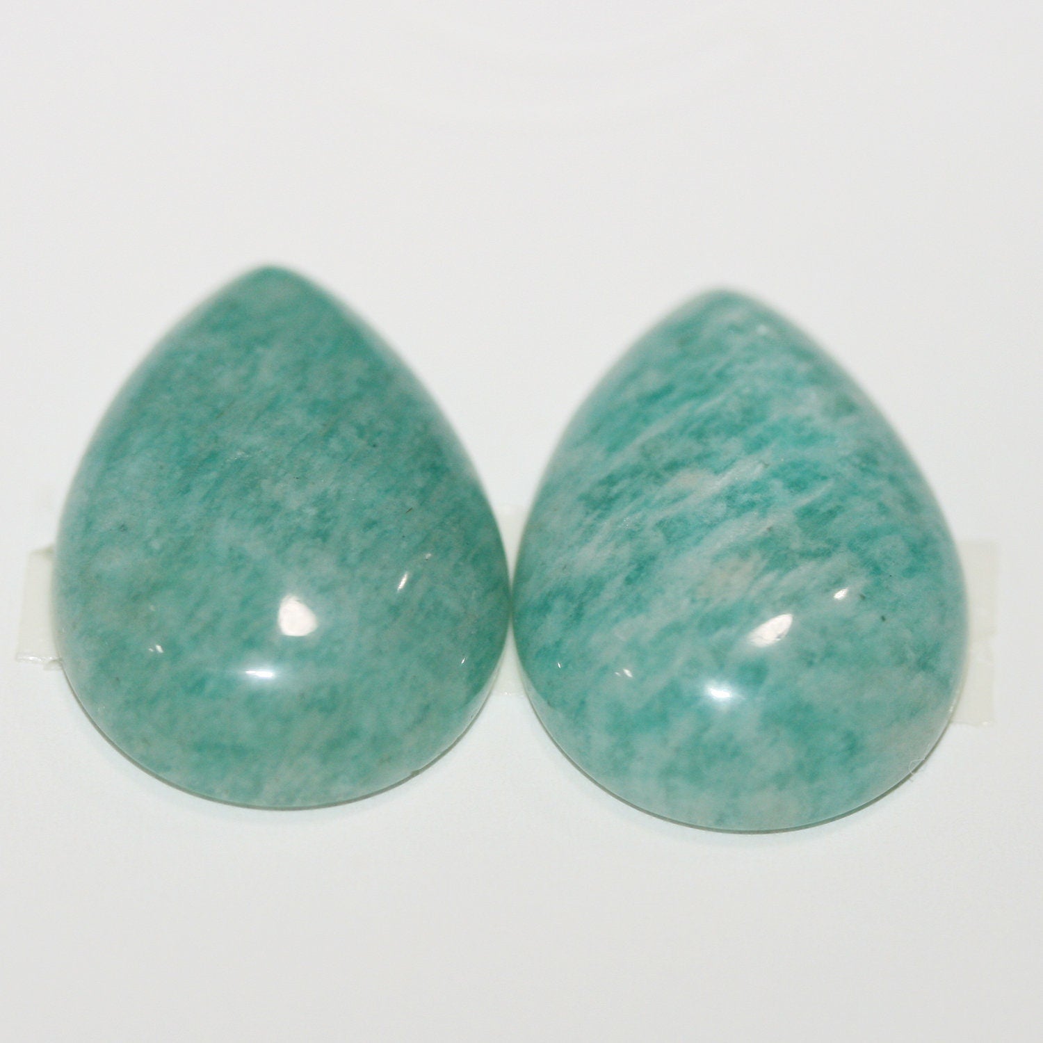 Lote de 2 cabujones de amazonita lisos de 25 x 18 mm. (2 piezas)