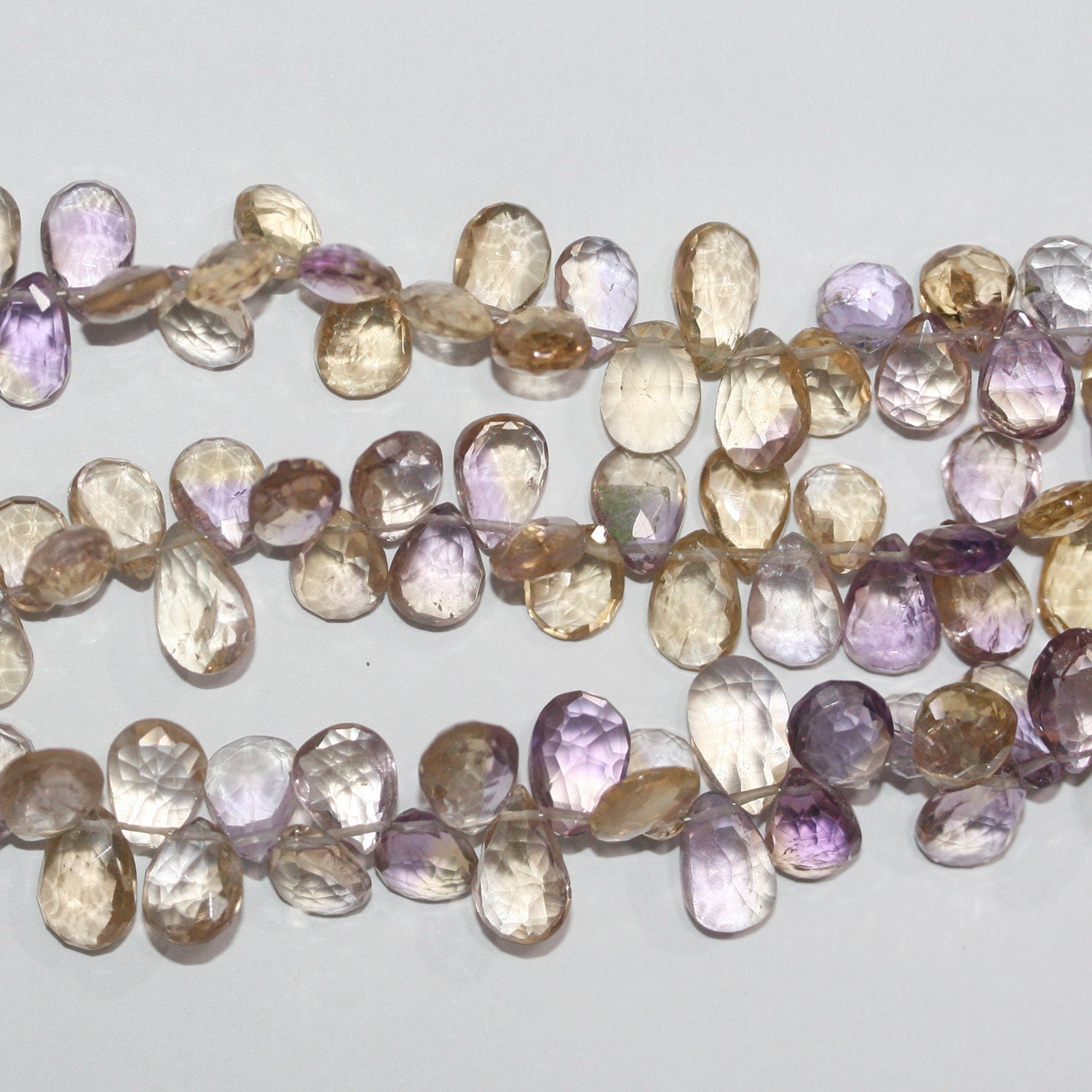 Cuentas de ametrina facetadas de 8" de St., 10 x 7 mm. Aprox. - Hilo de 20 cm.