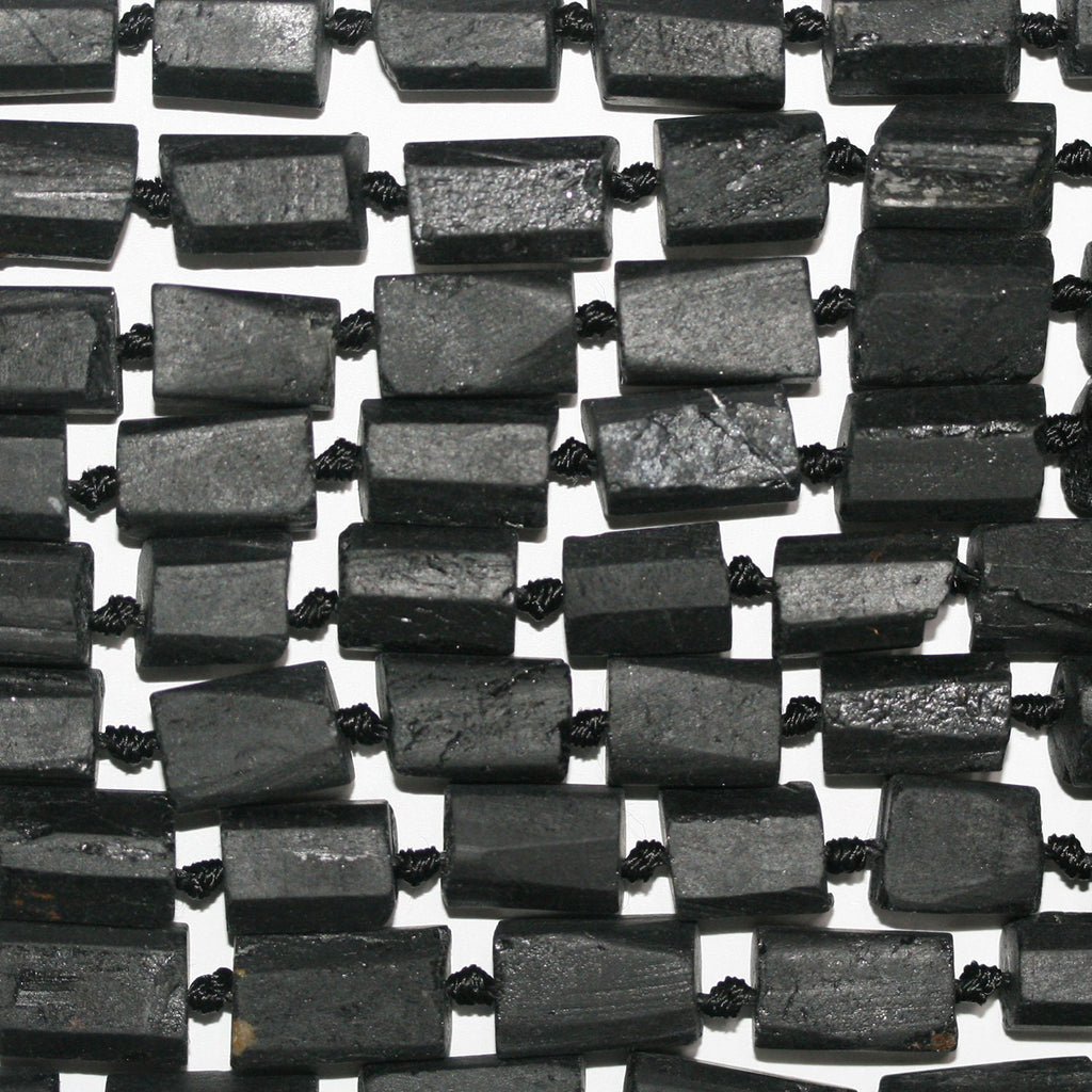 Cuentas de turmalina negra facetadas sin pulir, 16", 14 x 10 mm. Longitud aproximada: 40 cm.