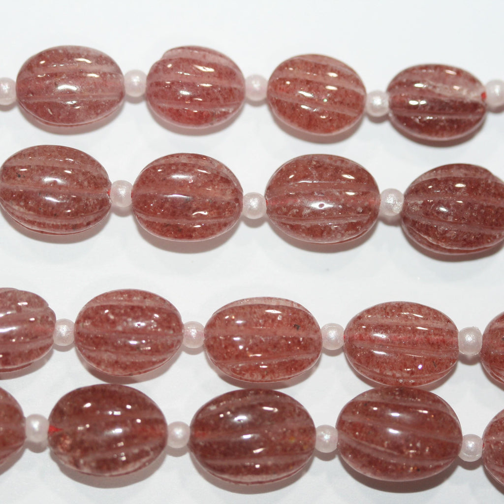 Perles ovales en quartz St. Cherry de 8 pouces (10 x 8 mm). Longueur approximative du brin : 20 cm.