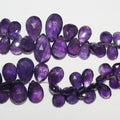 Perles en améthyste de 23 cm (9 pouces) à facettes graduées, 13 x 10 à 22 x 16 mm. Longueur approximative du brin : 23 cm.